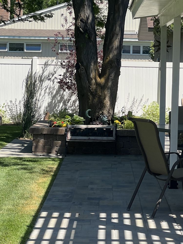Backyard Patio with Tree Planter